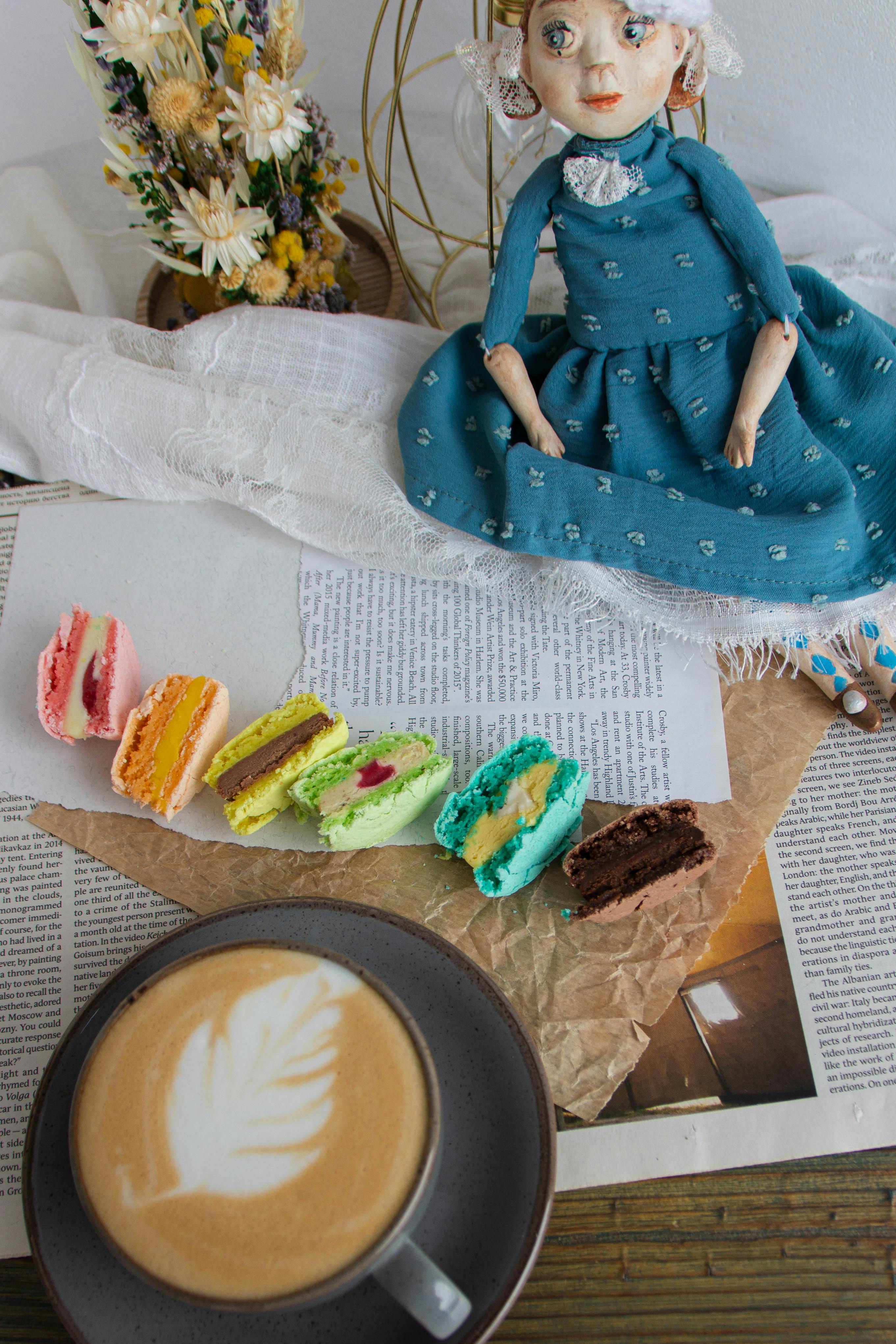 coffee colorful cookies and doll