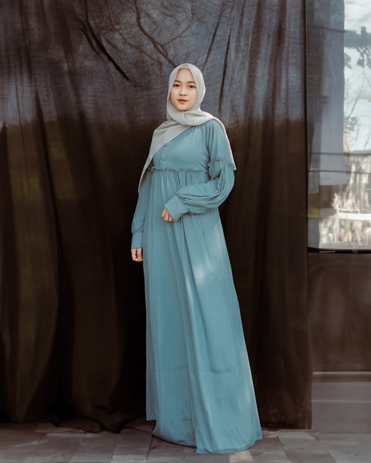 Young Woman In Hijab Posing On Black Cover Background