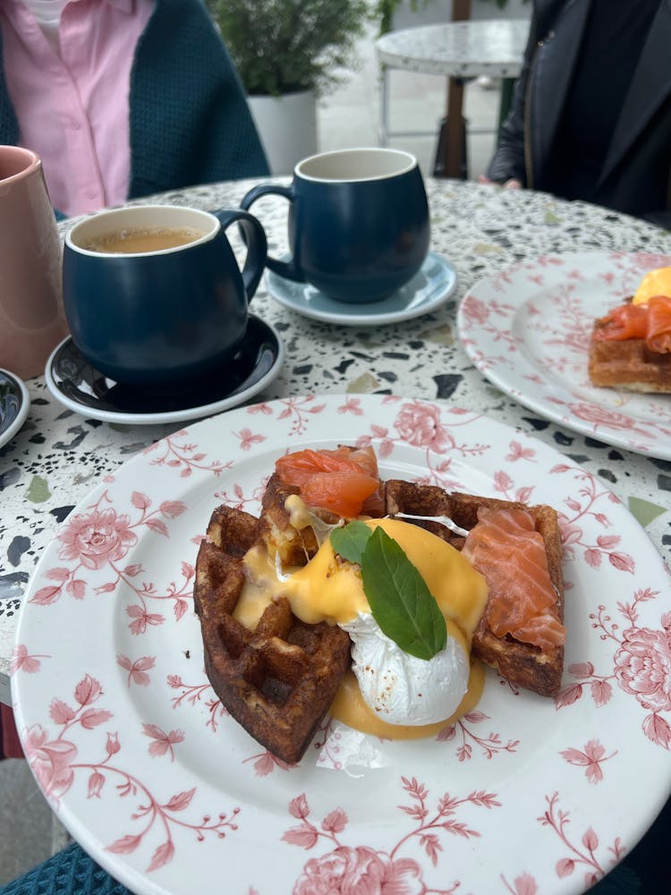 Waffle And Cups On Table