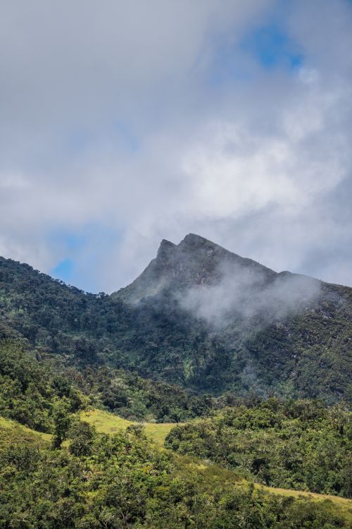 Free Breathtaking view of lush mountains and swirling clouds in Manta, Colombia. Stock Photo