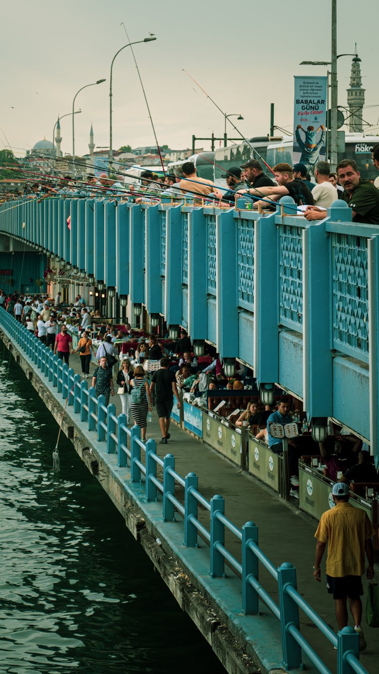 People On Galata Bridge In Istanbul