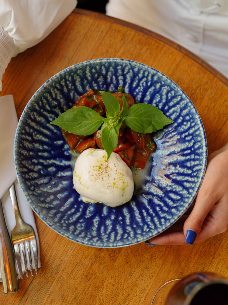 Woman Hand By Plate With Food