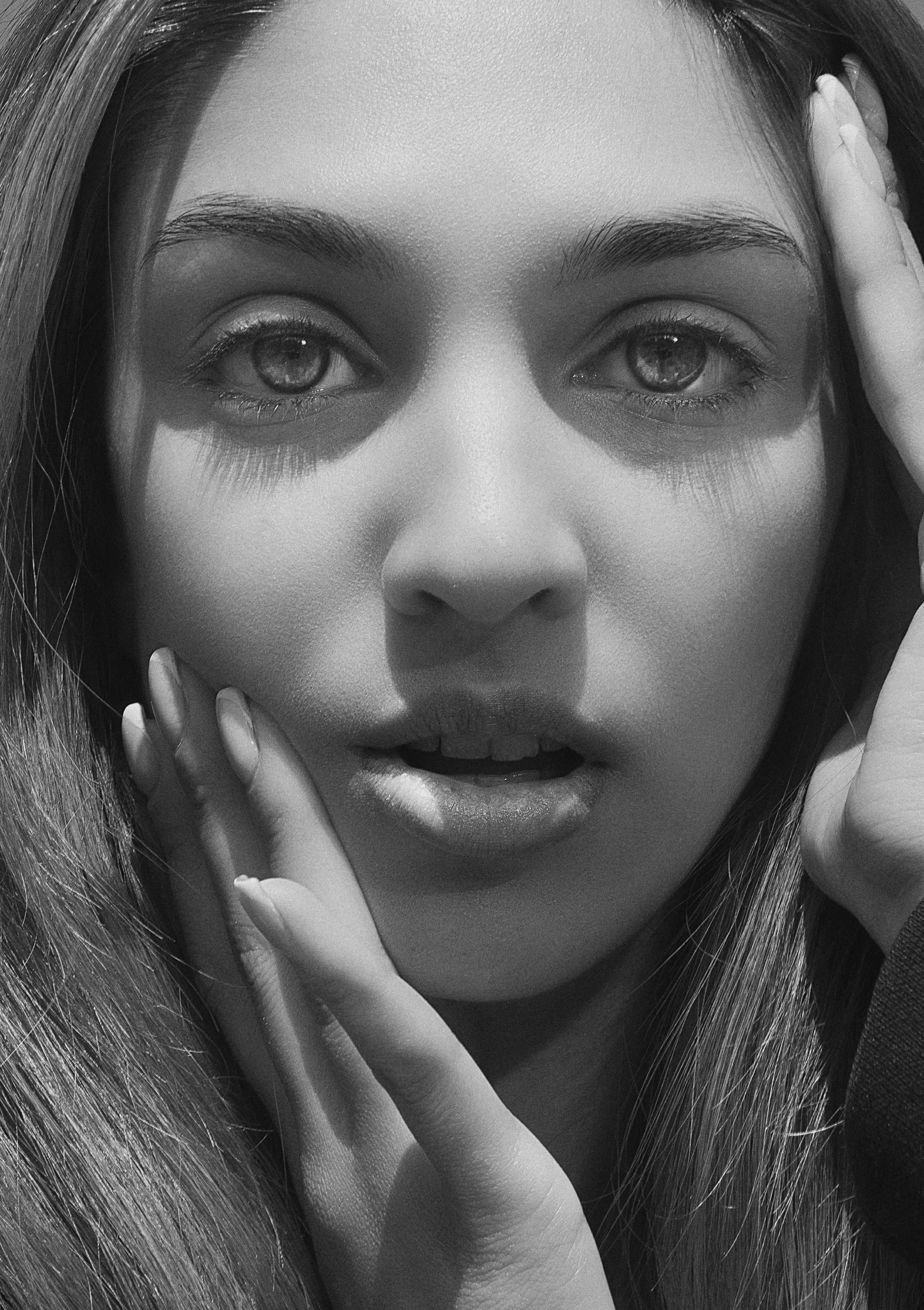 Black And White Portrait Of Woman Touching Face With Hands · Free Stock ...