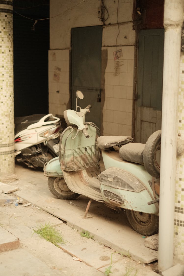 Vintage Motor Scooter Near Building