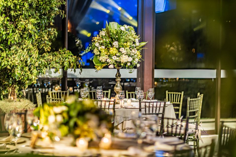 Formal Philadelphia event table setting with floral centerpiece, glassware, and elegant linens