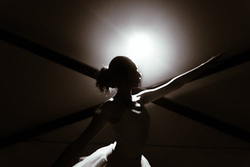 A Backlit Photo of a Ballet Dancer 