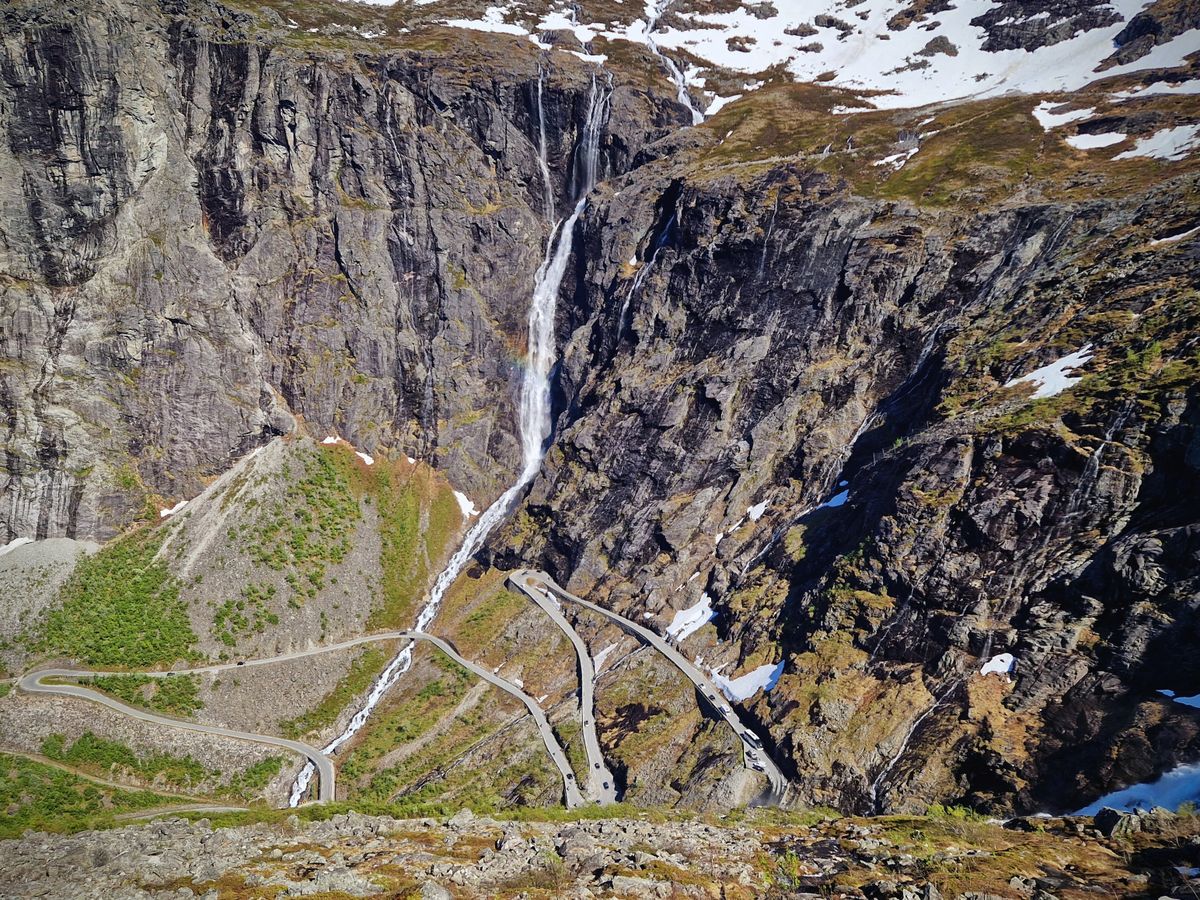 The hairpin switchbacks and Stigfossen waterfall of the Trollstigen mountain road, Norway