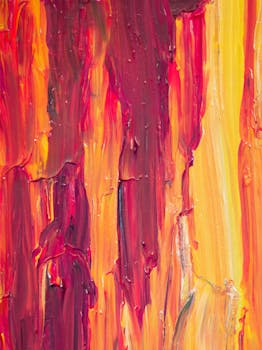 Colorful abstract oil painting texture with vivid brush strokes and dynamic layers.
