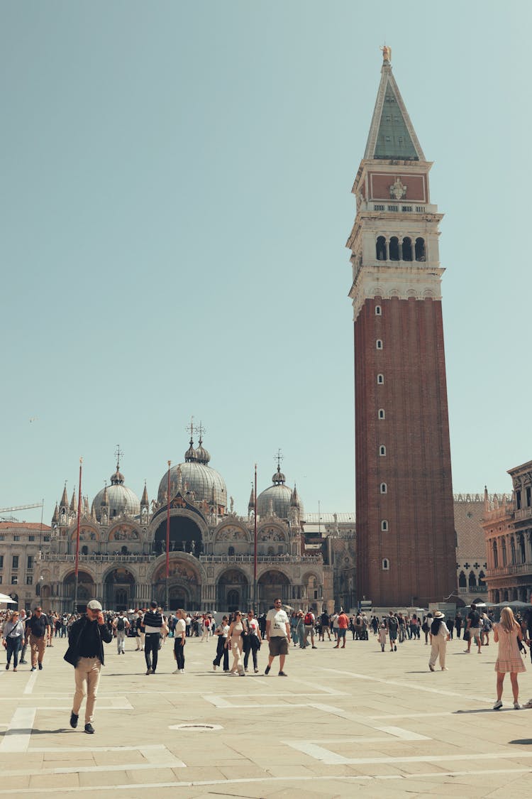 View Of A Crowded Piazza San Marco In Venice With The St Marks Basilica And Campanile In The Background 