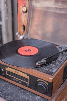 Close-up of a classic vinyl record spinning on a vintage gramophone.