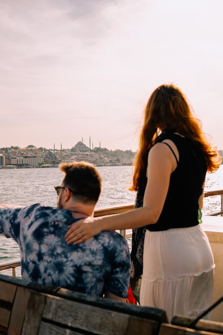 Man And Woman Looking At Bosporus And Istanbul In Turkey