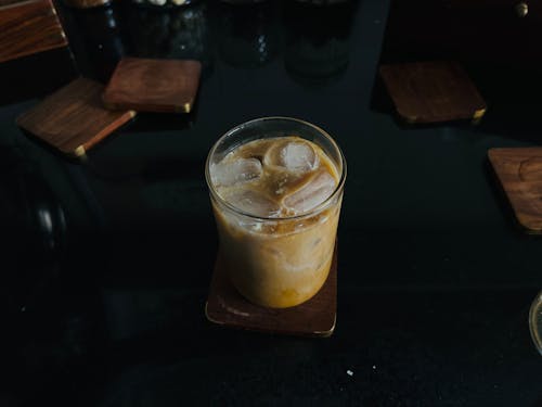 Photo of an Ice Coffee on a Dark Table