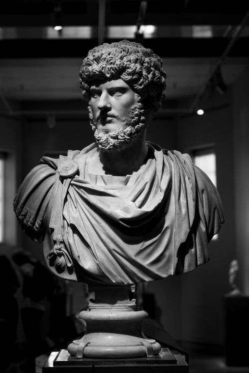 Free Black and white image of a Roman bust in a Toronto museum exhibition. Stock Photo