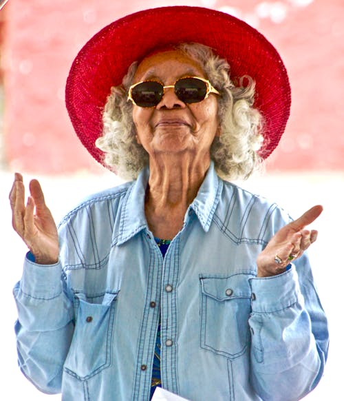 Free Woman Wearing Red Hat and Sunglasses Stock Photo