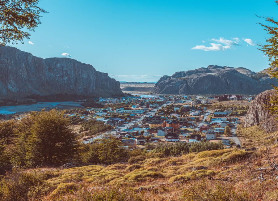 Explore a charming village nestled in a scenic Patagonian valley, surrounded by stunning mountain views.