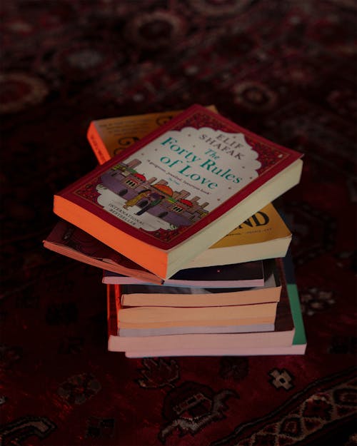 Stack of Books on Rug