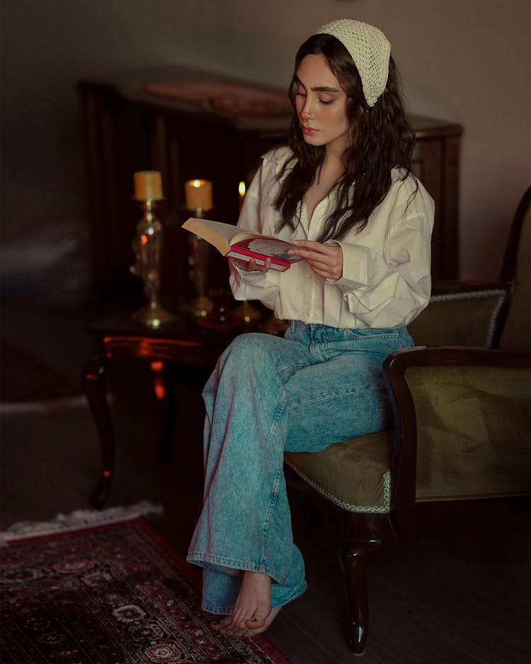 Woman Sitting And Posing With Book