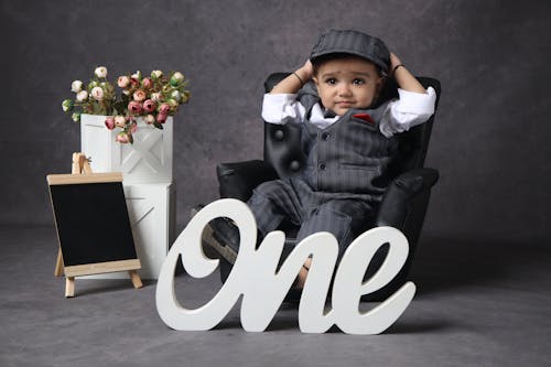 Free A Baby Boy at a First Birthday Photoshoot  Stock Photo