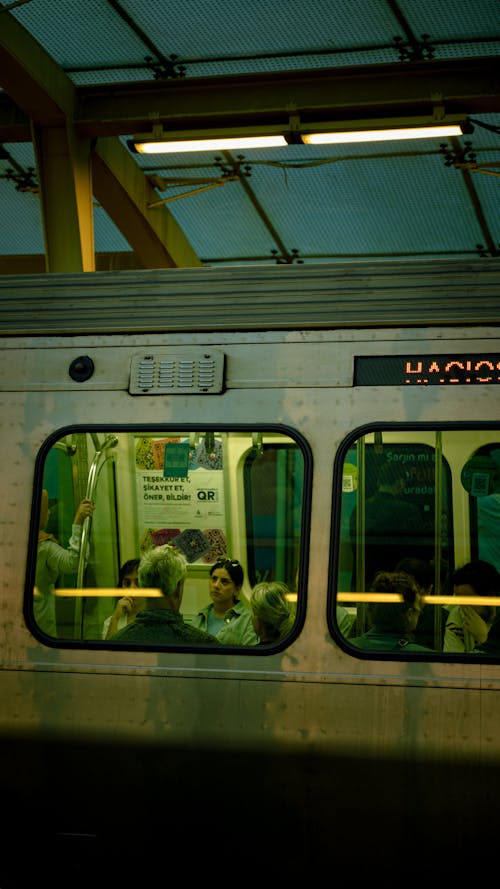 People in a Subway Photographed from the Outside 