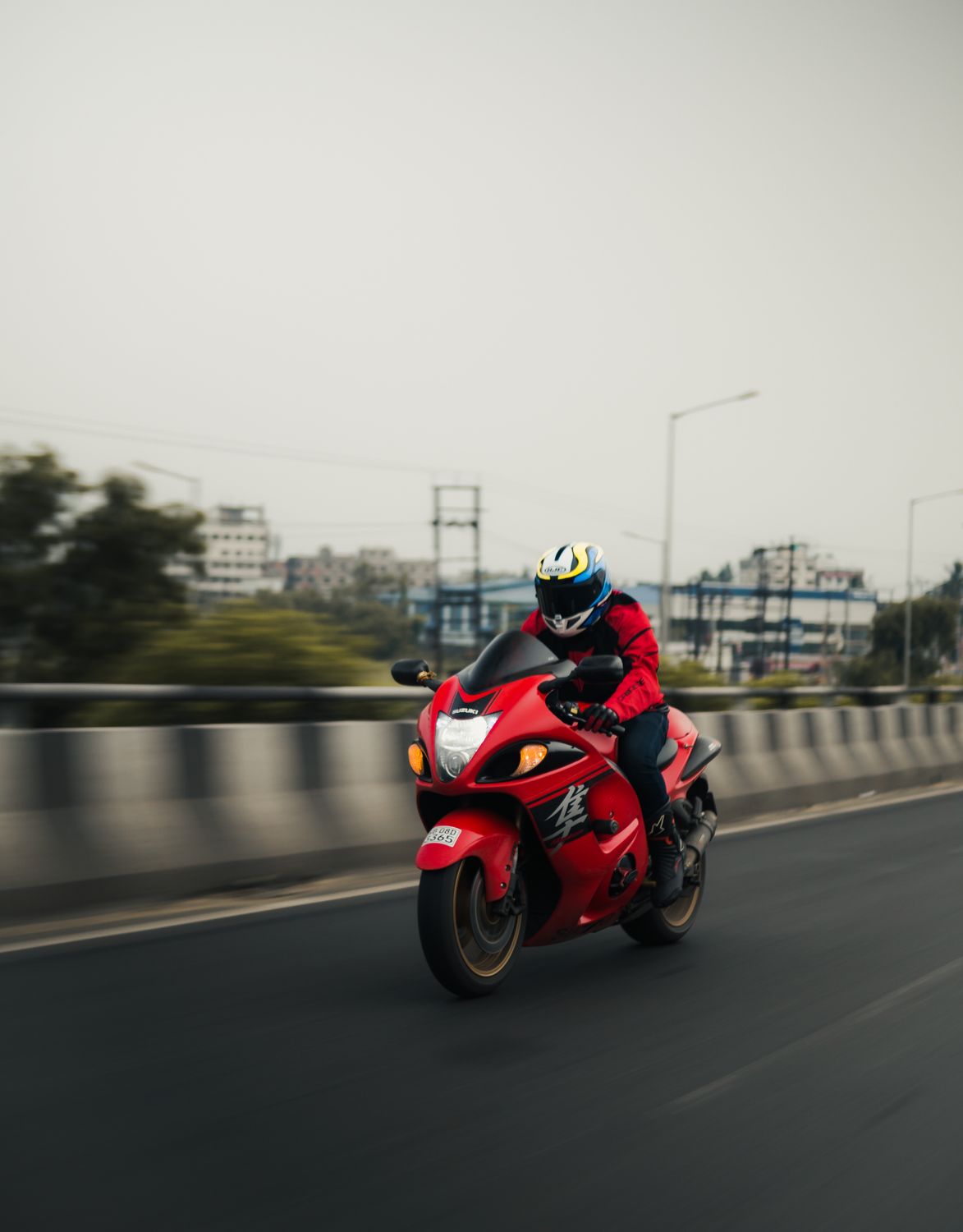 Hayabusa Riding Position Man Riding Red Suzuki Hayabusa · Free Stock Photo