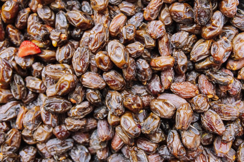 A detailed view of fresh and organic dried dates perfect for healthy snacking or cooking.