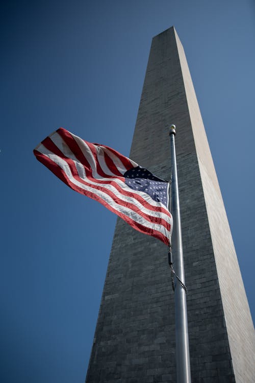 National Flag on Flagpole near Monument