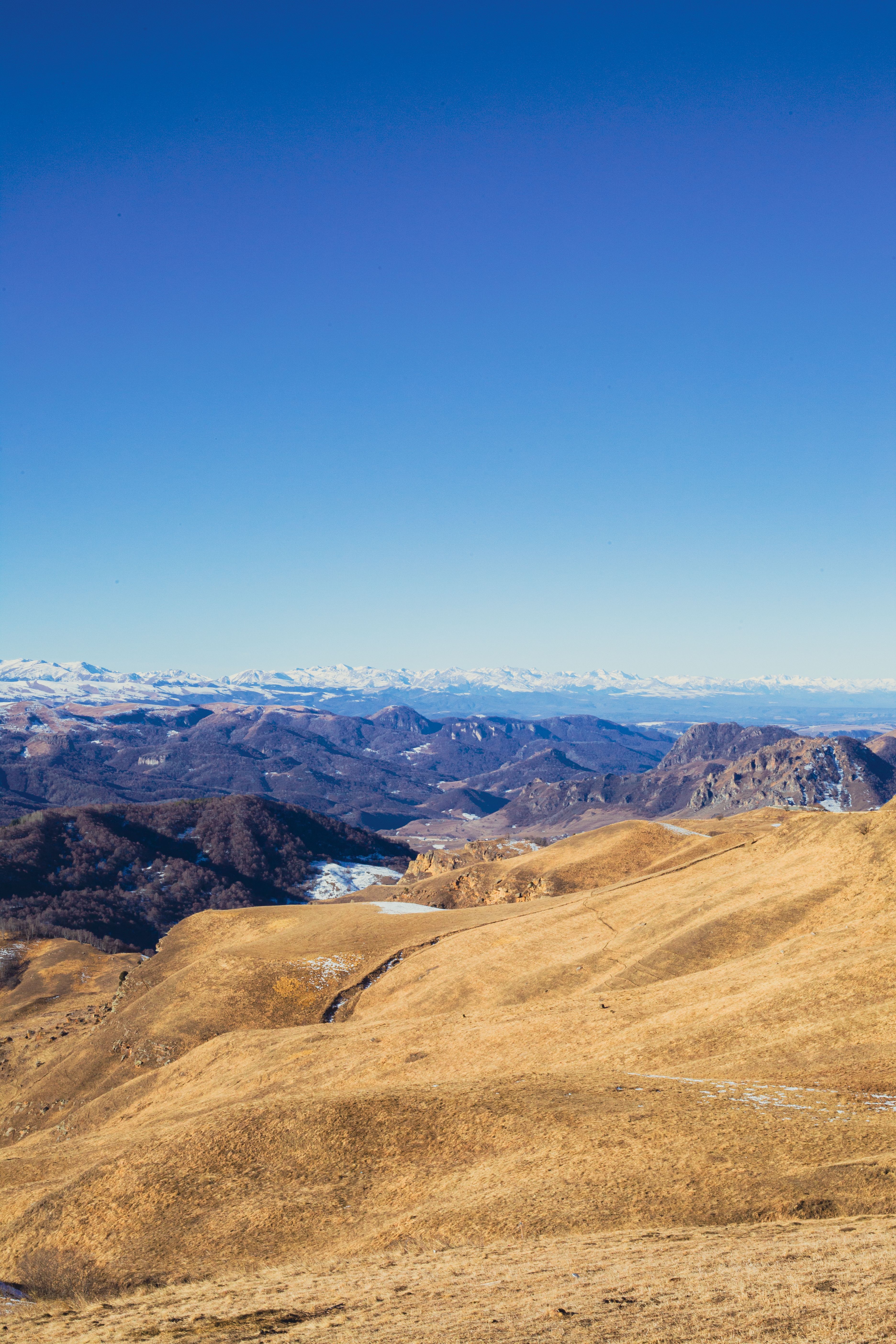 Clear Sky over Hills and Mountains · Free Stock Photo