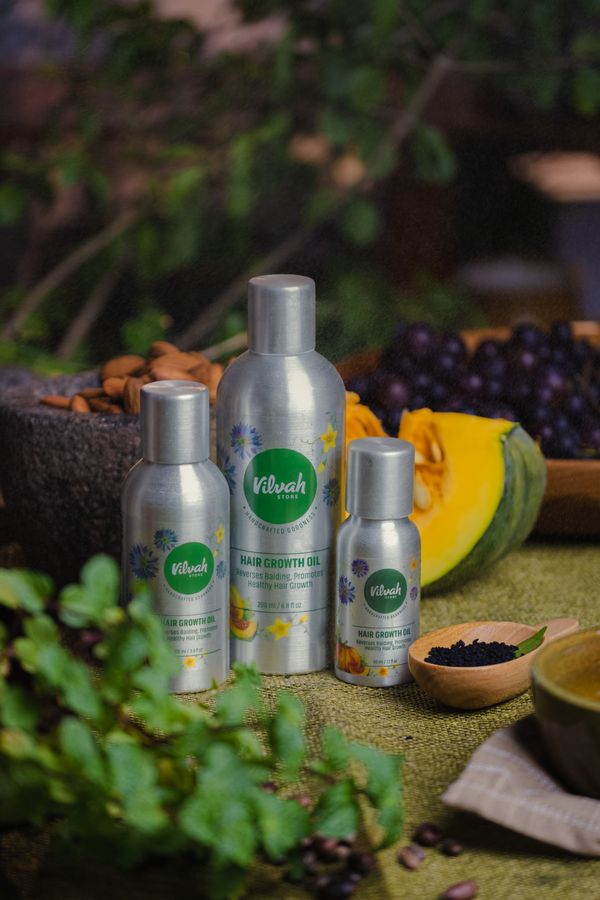 Hair oil bottles with natural ingredients