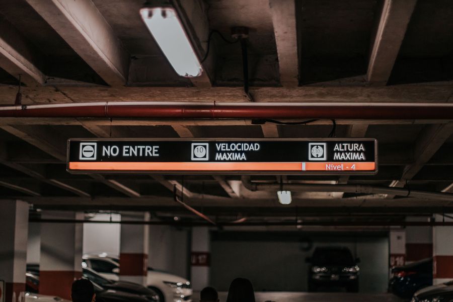 Cars parked inside a multilevel parking structure