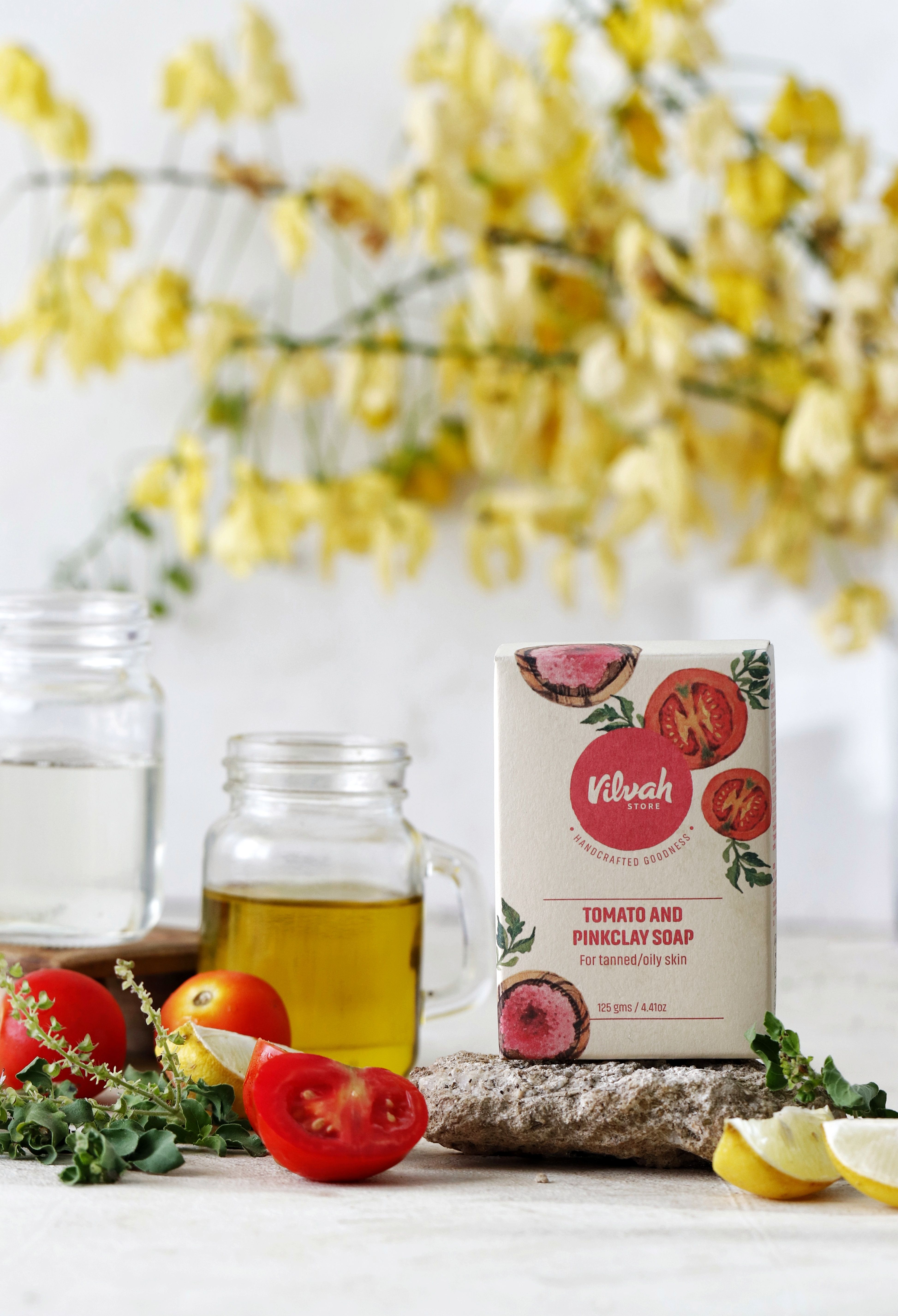 Organic tomato and pink clay soap with fresh ingredients and natural oils, perfect for skincare.
