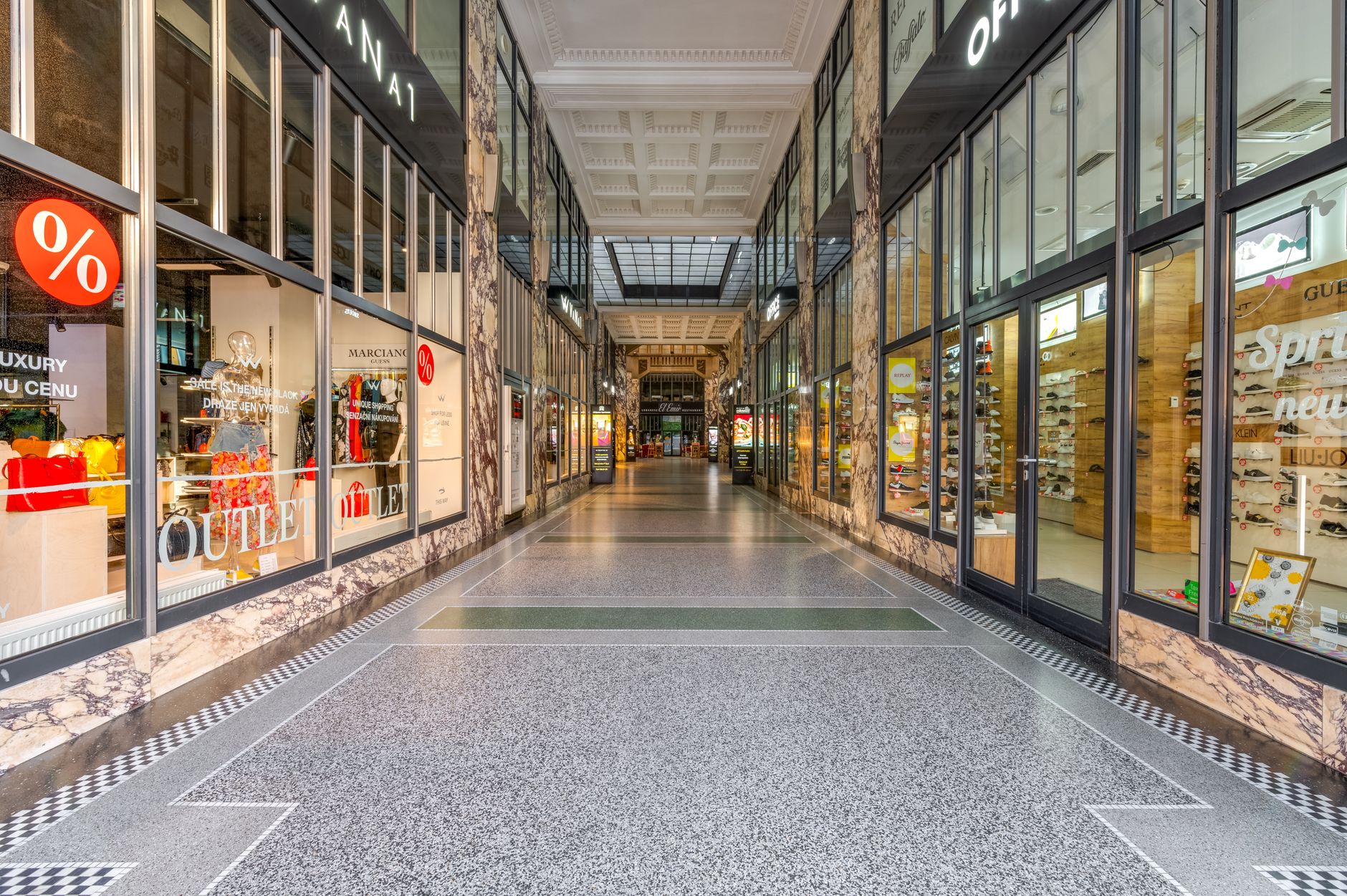 An architectural view of a stylish shopping mall corridor in Prague, Czech Republic.