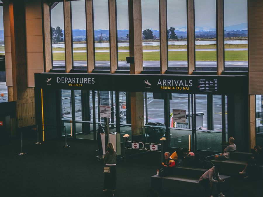 Airport signage directing passengers to gates and transfers
