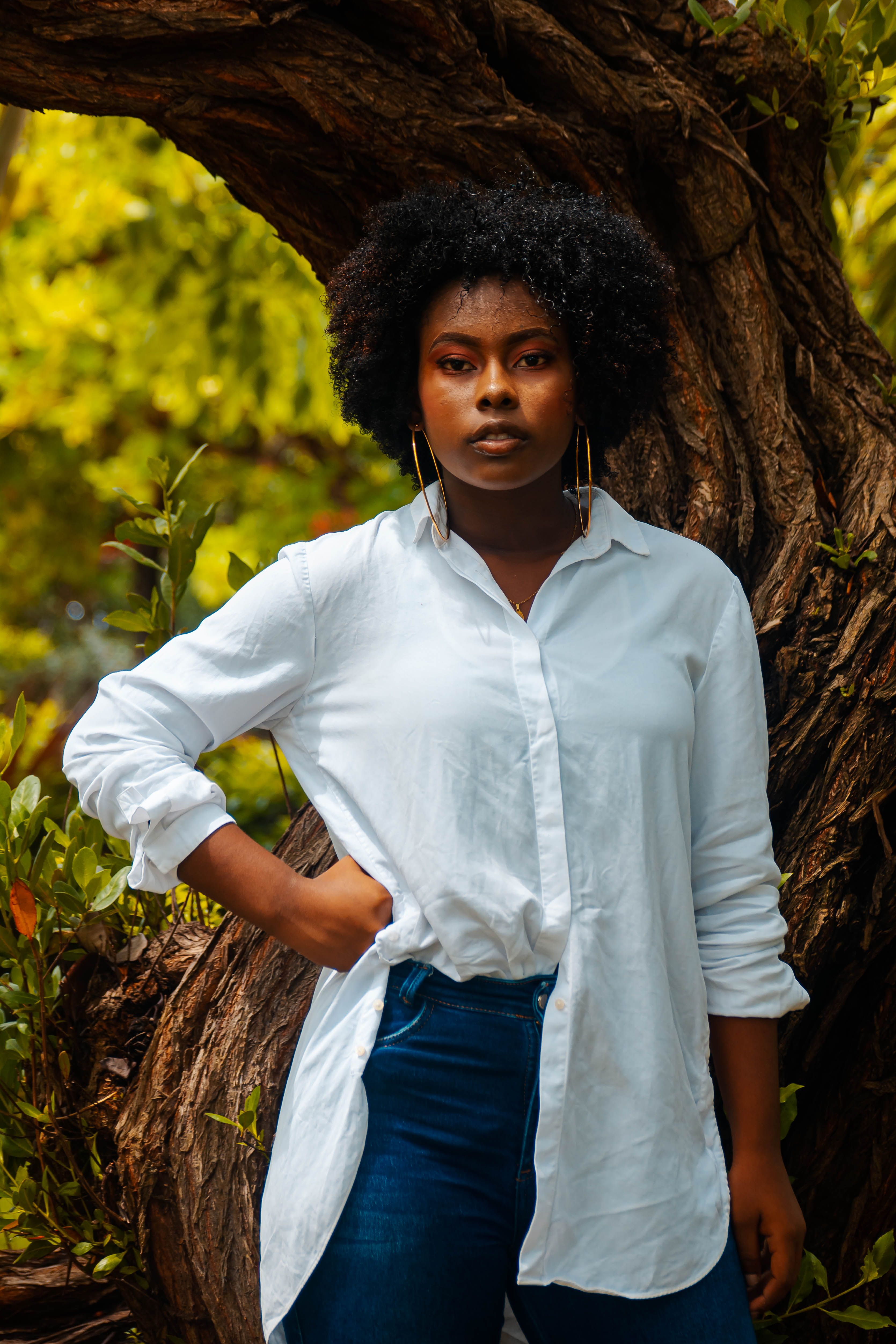 Portrait of Woman in White Shirt · Free Stock Photo