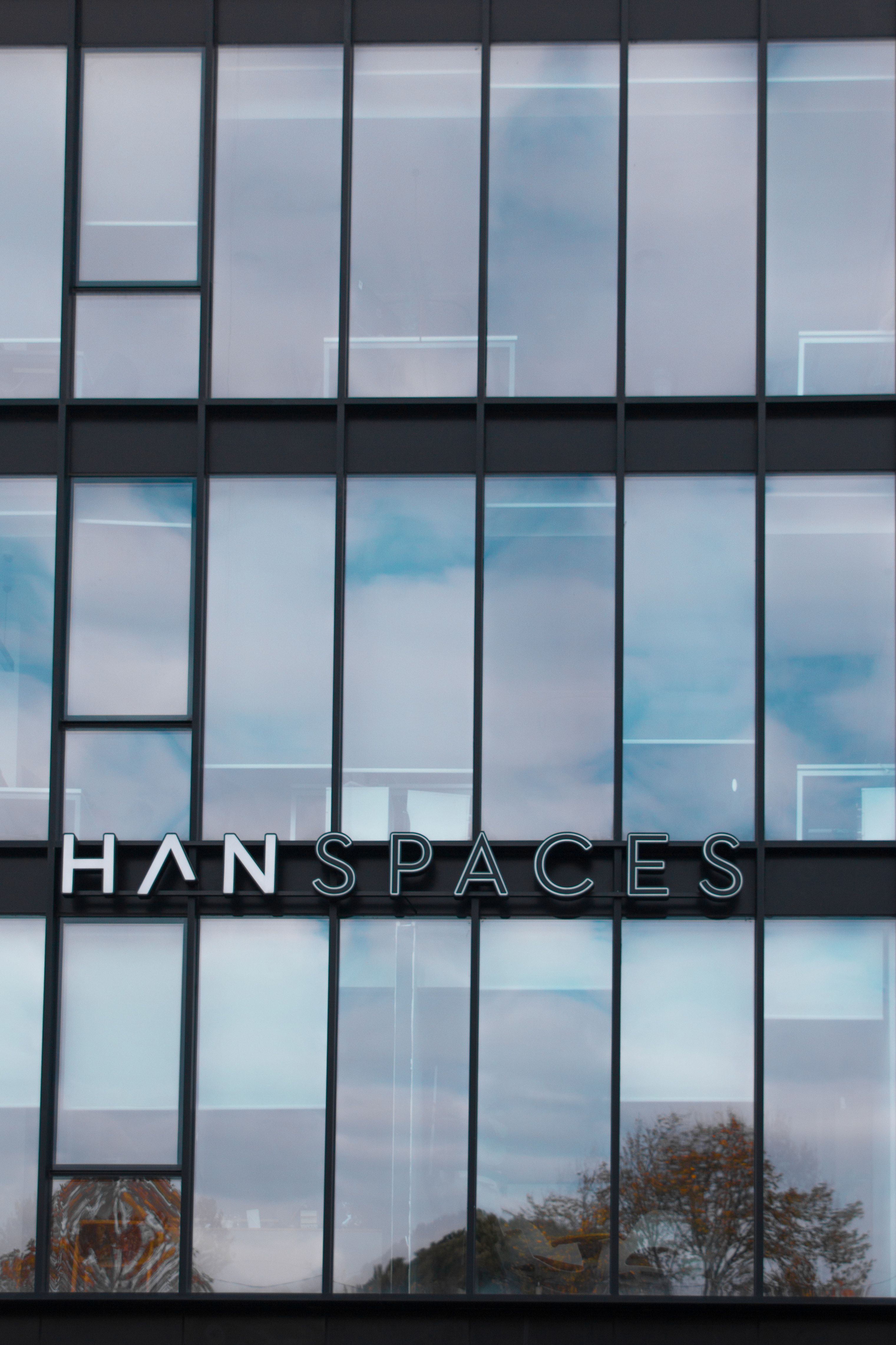 Close-up of a modern glass facade office building in Istanbul, Turkey.