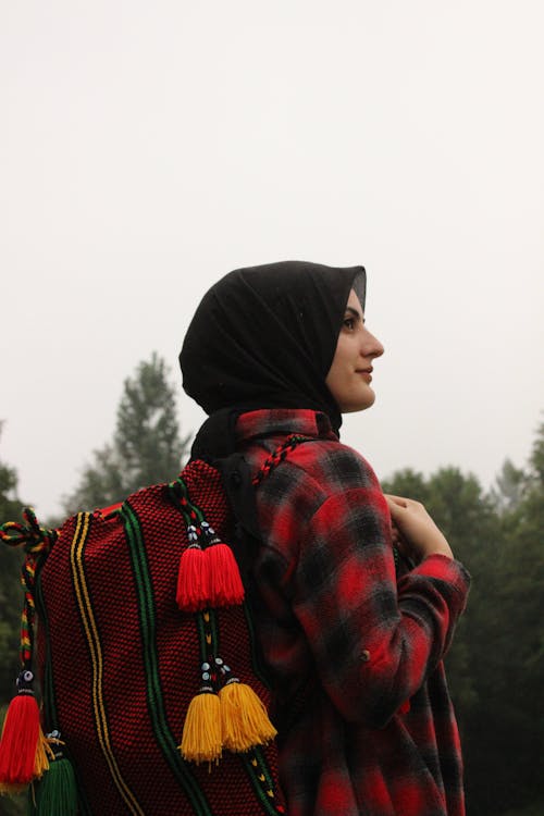 Woman in Hijab and with Backpack