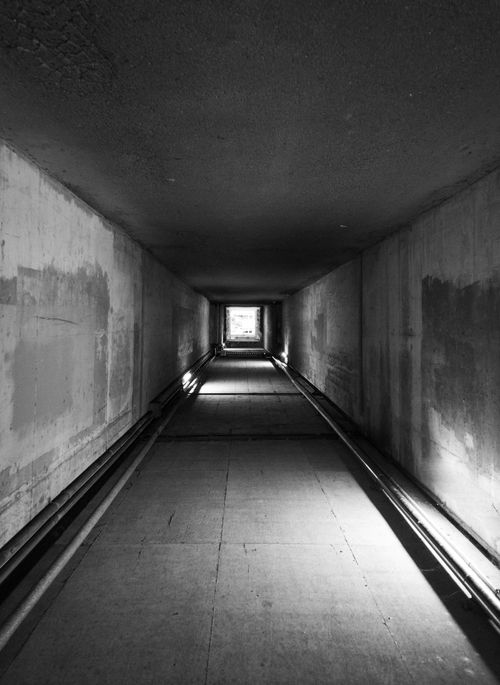 Free Explore a stark, empty tunnel in Toyohashi, Nhật Bản, captured in black and white. Stock Photo