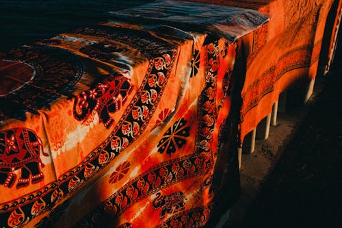 Free Onate Fabric with Elephant Covering Table Stock Photo