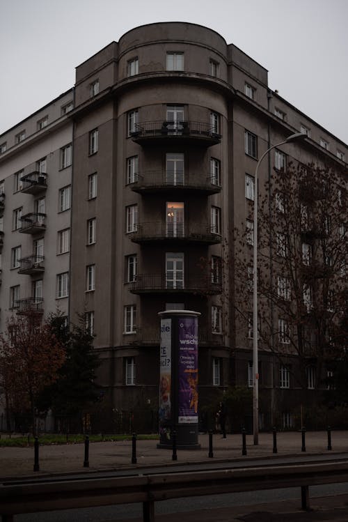 Advertising Pole next to a Corner Residential Building