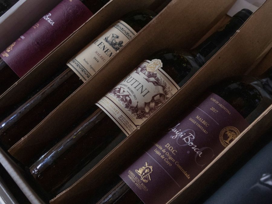 Case of assorted wine bottles