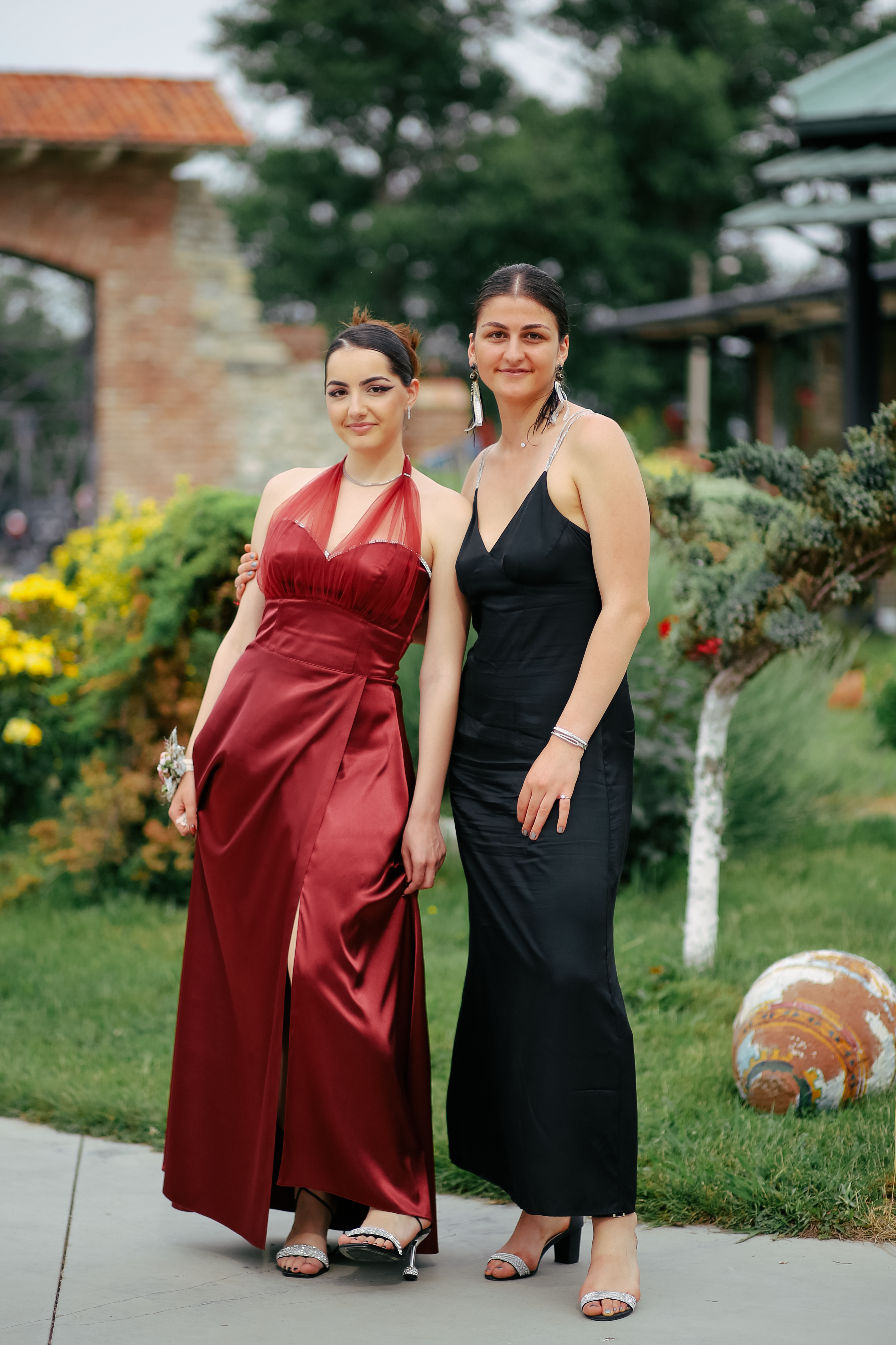 Women Posing Together in Dresses · Free Stock Photo