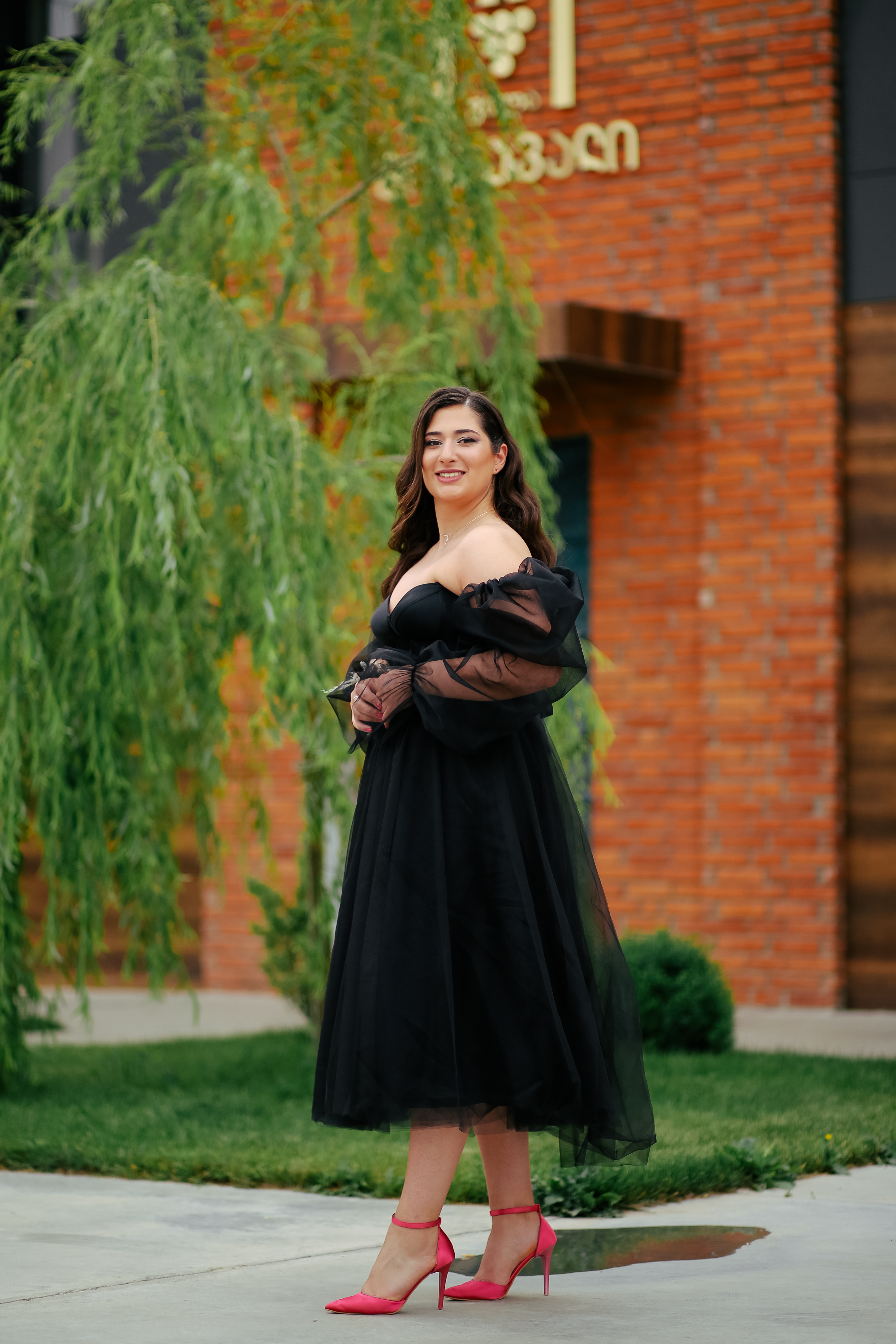 Woman in Black Dress on a Street · Free Stock Photo