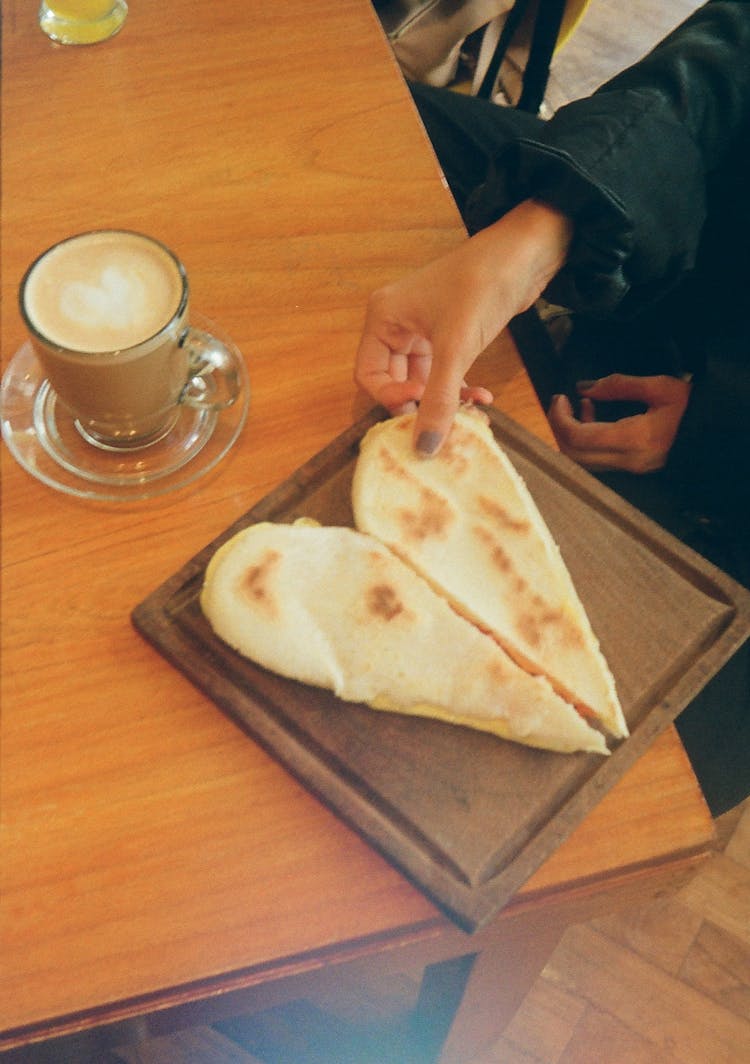 Woman Hands Holding Cake In Heart Shape