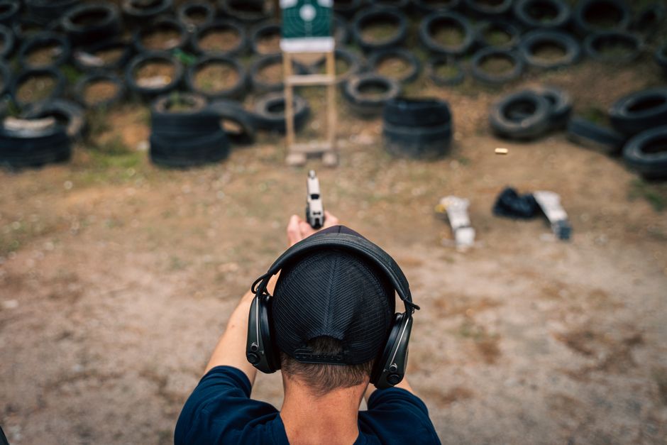 Professional shooting competition and retail firearm sales display Professional shooting competition and retail firearm sales display