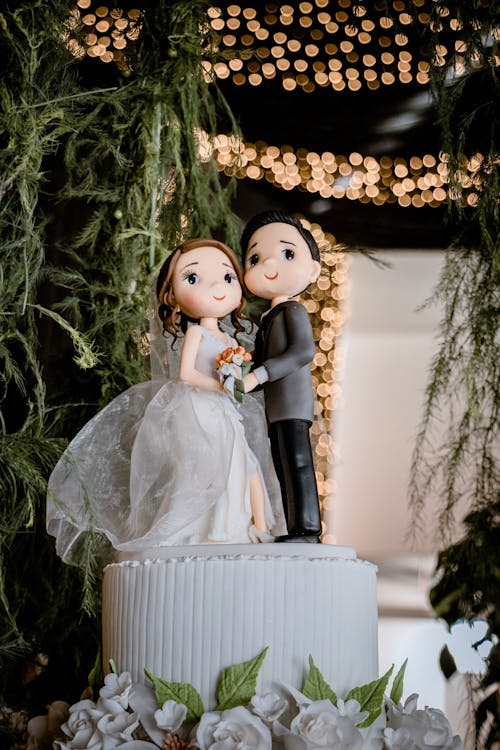 Figurine of Newlyweds on Wedding Cake