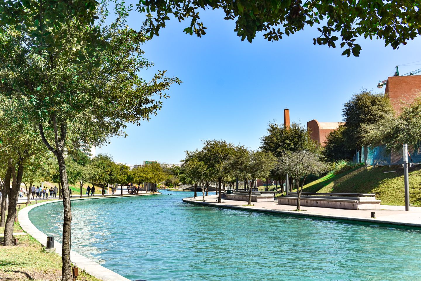 The Esplanade reflecting pool at Fair Park on a sunny day