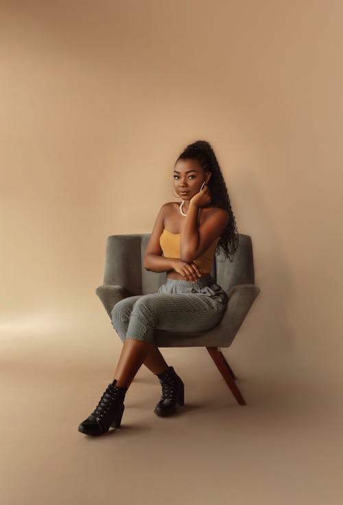 Young Fashionable Woman Posing in Studio 