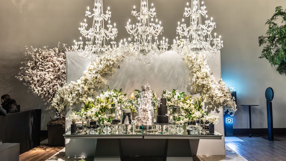 Luxury reception with chandeliers and lavish floral arrangements