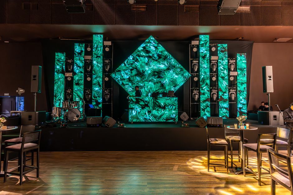 Professional stage lighting and LED walls highlighting a corporate keynote - technical event production Professional stage lighting and LED walls highlighting a corporate keynote - technical event production