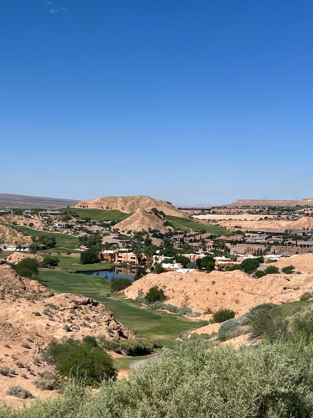 Desert hills, homes and golf greens in the Las Vegas Valley
