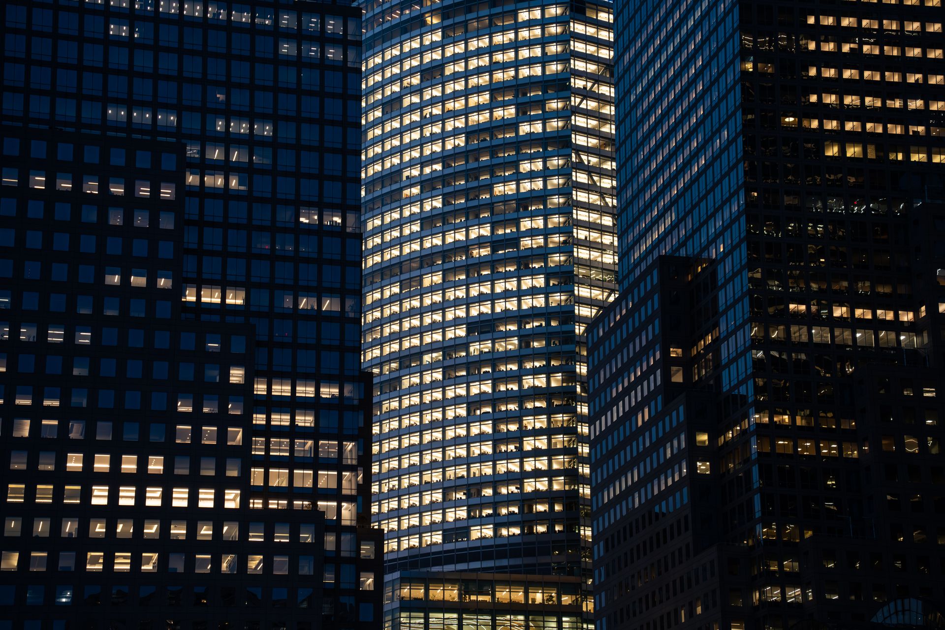 The business district after dark, seen from the firm's floor